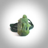 This is a lovely New Zealand Jade, woman carved into the jade stone drop pendant. Hand carved for us in Jade. It is bound with an adjustable brown coloured cord which is length adjustable. Free worldwide shipping.